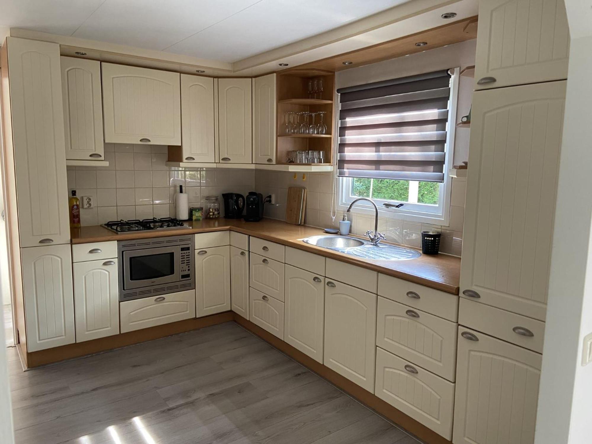 Veluwe Vakanties: Chalet Retreat with Private Sauna in National Park Putten Exterior photo